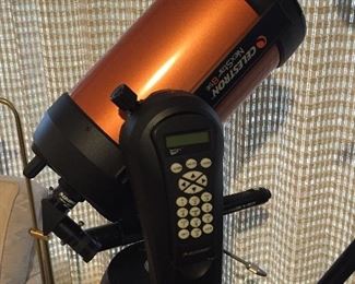 Celestron 8se digital telescope with accessories.
