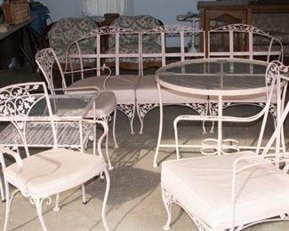 Several pieces of Woodard wrought iron furniture