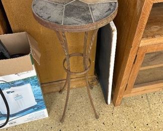 Stone and iron plant stand 