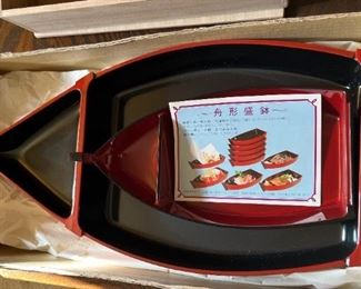 Set of lacquer boat shape serving dishes; original box