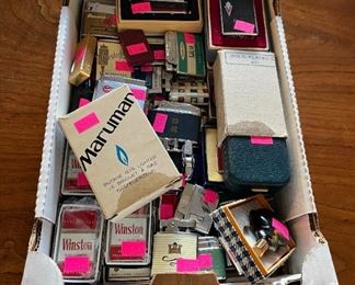 Box of lighters - mostly all new and unused