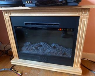 Heat surge fireplace heater w/ remote