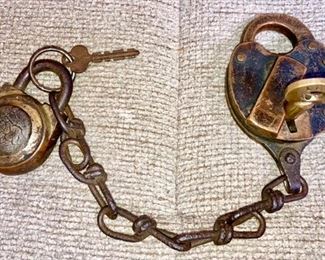 Antique brass padlocks w/ chain, larger padlock is marked St. Louis and key is marked ICRR (Illinois Central Rail Road (great piece)