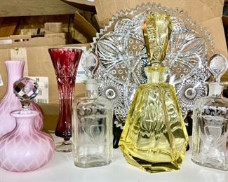 Pink diamond satin glass vase & cruet, red cut to clear vase, etched bottles (pharmacy?), beautiful yellow crystal decanter, large pressed glass round plate