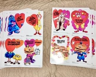 Many uncut sheets of vintage 1974 McDonalds Valentines (4 on each page)