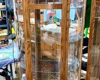 Modern lighted half moon curio cabinet with glass shelves 