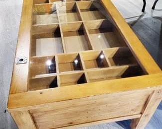 Very unique Coffee Table. Glass Top to view contents or your favorite collection! $50.