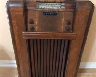 A great all original Philco console radio. Beautiful case. Powers up with a hum.