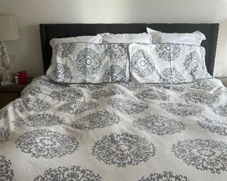 King sized bed with headboard and rails and mattress and bedding $500