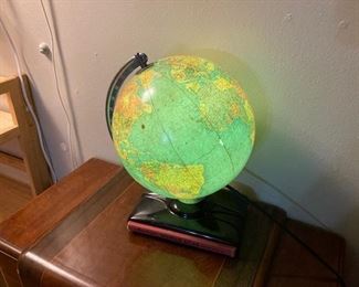 lighted globe with book circa 1950