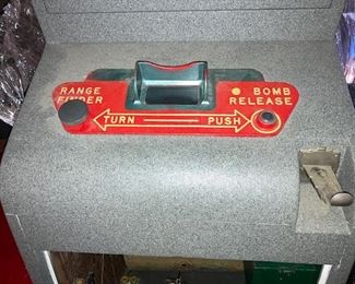 This is a nickel machine. Look through the view finder, move the range finder and drop the bombs.