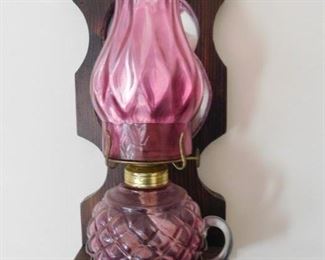 Pair of cranberry oil lamps
