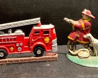 Two Wrought Iron Fireman Themed Door Stops