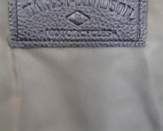 Authentic Harley Davidson Jacket signed by Willie G Davidson himself as well as Karen Davidson with original hanger