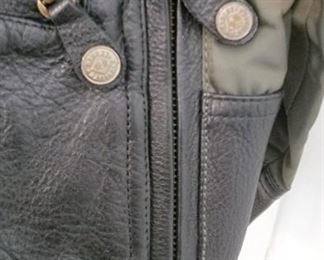 Authentic Harley Davidson Jacket signed by Willie G Davidson himself as well as Karen Davidson with original hanger