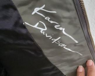 Authentic Harley Davidson Jacket signed by Willie G Davidson himself as well as Karen Davidson with original hanger