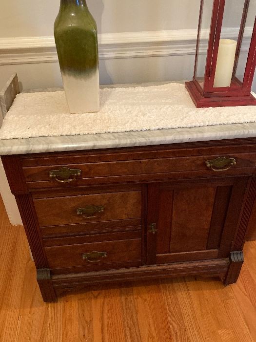 Lovely marble topped chest with shelf