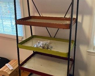 Neat shelving unit.  Perfect for a boy’s room or a man cave.