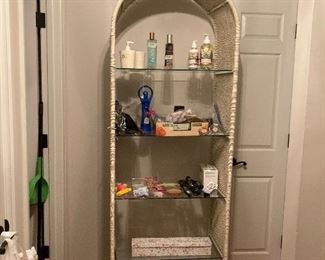 Wicker and glass shelving unit