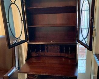 Mahogany drop down secretary with bookcase, convex glass