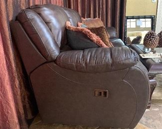 Leather reclining sofa--as is with damage