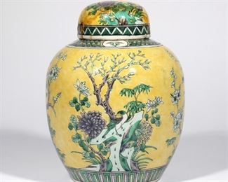 Lot 90  |  19TH CENTURY CHINESE FAMILLE JAUNE JAR  |  Jiaqing reign (1796-1820), showing dual-magpie on flowery branch
h. 10-1/4 dia. 7-1/2 in.