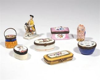 Lot 128  |  (8PC) ANTIQUE PORCELAIN SNUFF BOXES & FIGURES  |  Including three Battersea Bilston boxes: a shaped oval enamel box, late 18th century, with the bust of a lady with elaborate plumed headdress inscribed, "Long Live the King" (w. 2 in.), a round enamel box with a blue ground inscribed, "Lay Hold on Time While in Your Prime", and a relief decorated enamel box of rectangular shape with a bust of a lady on a pink ground; plus a Limoges rectangular pin box with yellow ground (w. 2-3/4 in.), an oval box decorated with a bird on the lid, a small box in the form a basket with handle, and two figures: a 20th century Herend red fishnet owl, and E. 19th C. Naples, Capo-di-Monte porecelain figure of a man in a yellow coat on a goat (Tailor)
