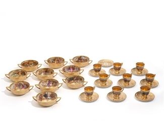 Lot 137  |  (29PC) RARE AMBROSIUS LAMM OPERA CHINA  |  Circa 1930, very rare and important porcelain dinnerware decorated with raised gilt and hand-painted with various scenes from Wagner's operas, with blue lamb marks, "Dresden / Made in Saxony", most with hand-painted titles, and all with gilt acorn or circle marks, comprising 10 double-handle soup bowls (2 Parsifal, 1 Gotterdammerung, 1 Walkure, 1 Rheingold, 1 Siegfried, 1 Fliegender Hollaender, 1 untitled showing a man with harp; 1 untitled showing a woman swooning; and 1 untitled showing a man kneeling before a woman in a yellow dress); 9 cups (1 Tannhauser; 1 Fliegender Hollander; 1 Rheingold; 1 Meistersinger; 1 Rienzi; 1 Siegfried; 1 Parsifal; 1 Gotterdammerung; and 1 Die Feen); and 10 saucers with swan and harp decoration and stylized monograms
h. 2-3/8 in. (cups) w. 6-1/2 in. (bowls)