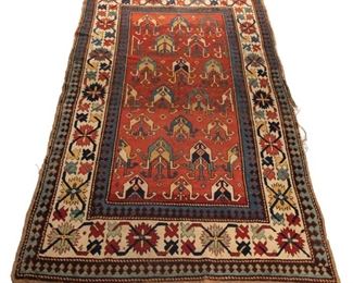 Lot 165  |  FACHRALO KAZAK WITH OVERALL BEETLE PATTERN  |  Circa 1870, alternating rows of two and three beetle motifs, main white border with chain of rosettes
h. 7 ft. 8 in. w. 4 ft. 4 in.