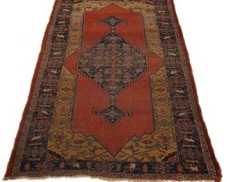 Lot 171  |  PERSIAN MEDALLION LONG RUG  |  Early 20th century, having a central medallion on a red ground
h. 8 ft. 8 in. w. 4 ft. 5 in.
