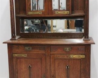 709 - Vintage English Court Cupboard Glass doors at top beveled mirrors back unusual hardware carved column adored upper rack 22 x 51 x 80
