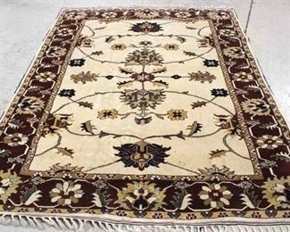 2060 - Hand knotted area rug has spotting 92 x 69

