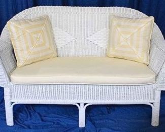 2082 - Wicker settee with 2 pillows 34x57x24
