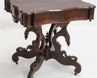 2248 - Fancy carved Victorian mahogany parlor table 30 x 29 1/2 x 25
