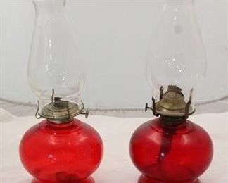 2414 - Pair red glass oil lamps 15" tall
