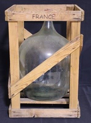 2458 - Large glass wine bottle in wooden crate 23 1/4 x 15 1/2 x 15 1/2 (size of crate)
