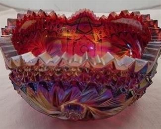 2879 - Red 7 1/2" carnival glass bowl signed S in circle
