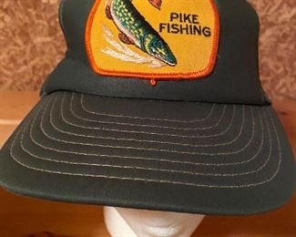 Vintage snap back hat with pike fishing patch.