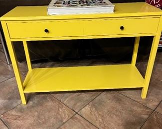 Yellow sofa or entry table