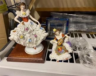 Dainty ladies of Dresden lace porcelain.