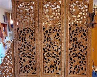 One of two carved wooden screens