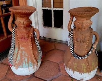 Pair of large terra cotta figural plant stands