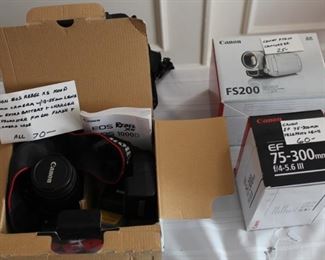 Canon EOS Rebel camera kit, Canon 300 mm. zoom lens, Canon FS200 camcorder.
