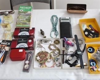 Ammunition, men's cologne, costume jewelry etc.