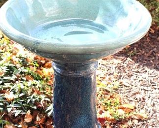Two piece pottery bird bath.
