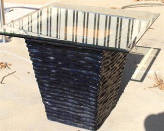 Pottery planter with plate glass top.