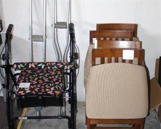 Walker, crutches and folding chairs.