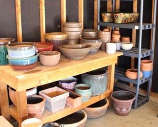 Large amount of decorative planters.