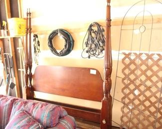 Poster bed and loveseat.