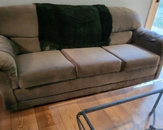 Couch w/queen bed
Glass coffee table 
